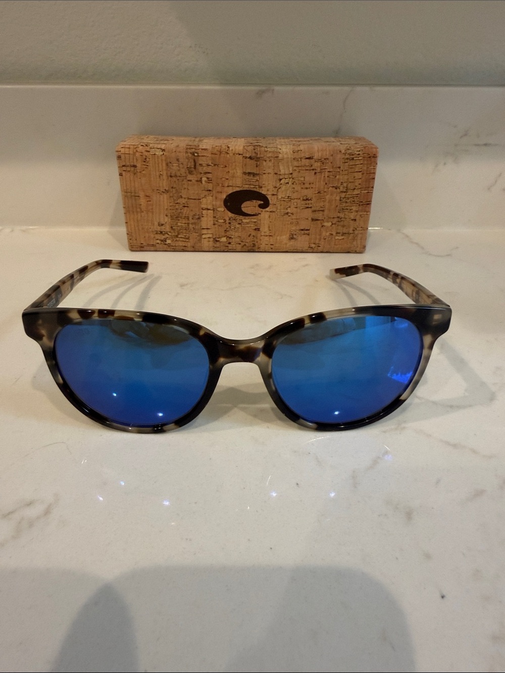 Costa Tortoise Frame Sunglasses with Blue Polarized Lenses.